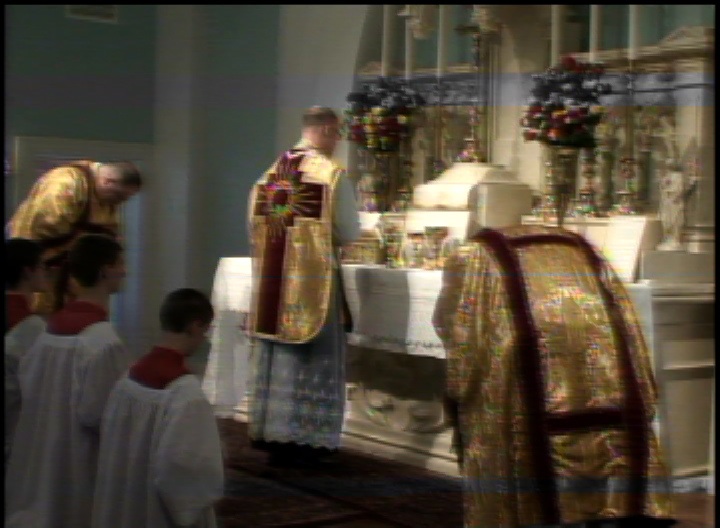 Priests saying the Confiteor at Mass