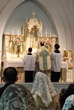 Father Nichols Offering Mass